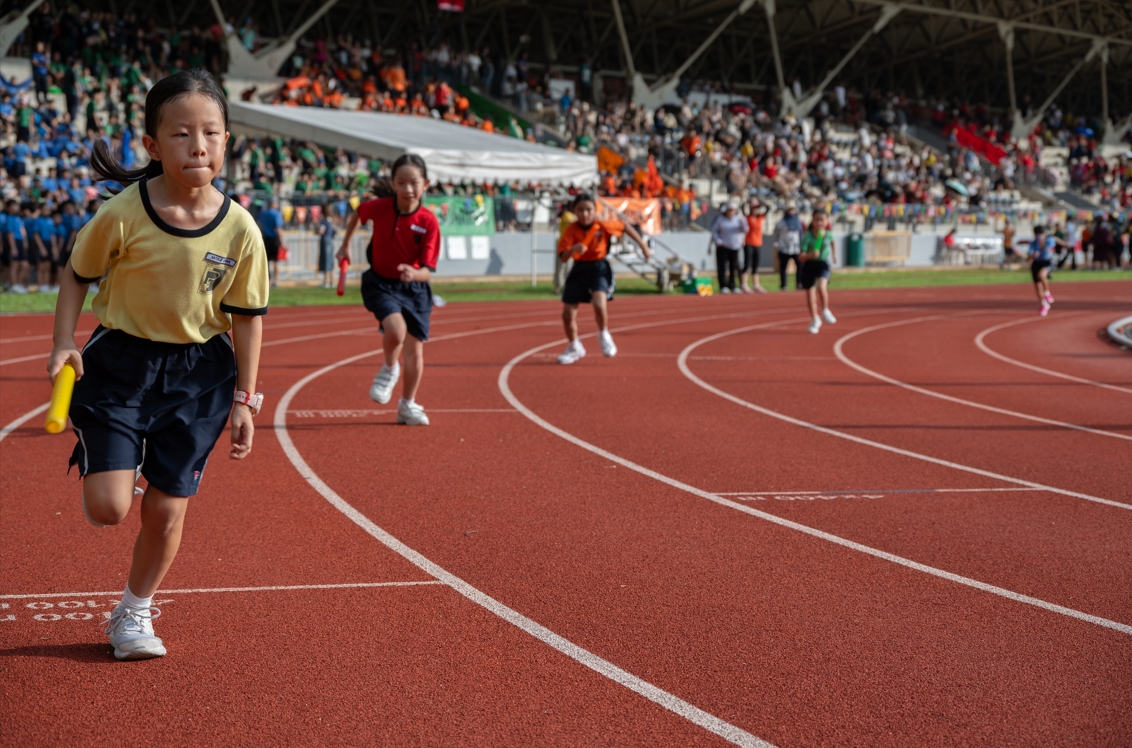 Student competing in a track race.